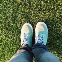 feet in grass