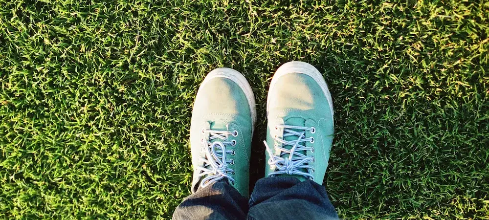 feet in grass